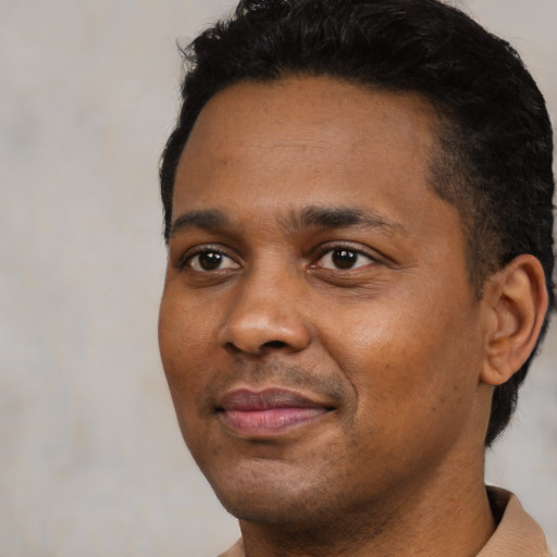 Neutral black young-adult male with short  black hair and brown eyes