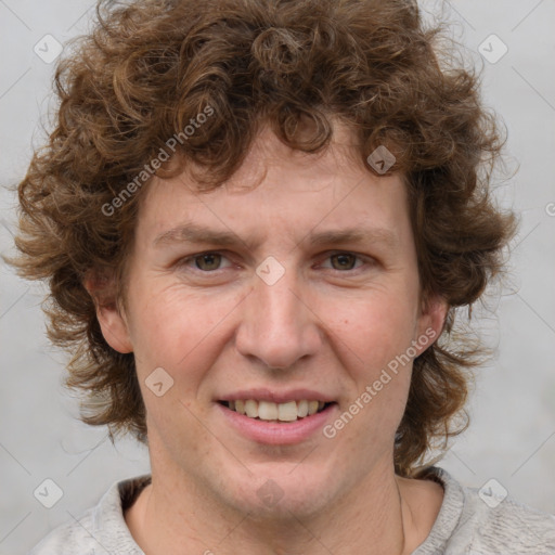 Joyful white adult female with medium  brown hair and blue eyes