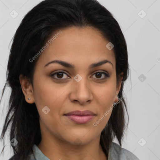 Joyful latino young-adult female with long  brown hair and brown eyes