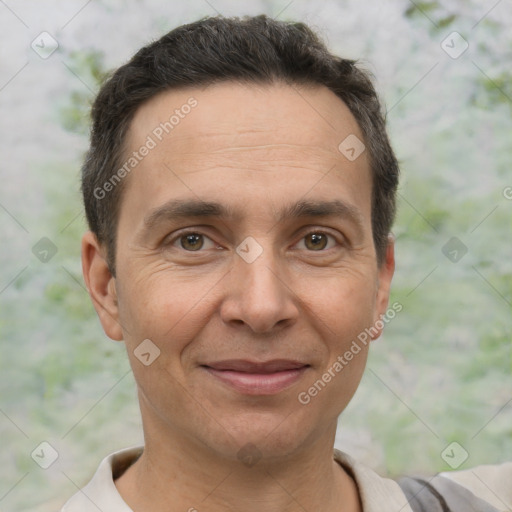 Joyful white adult male with short  brown hair and brown eyes