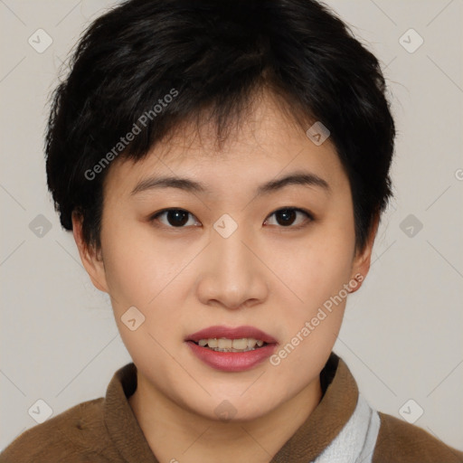 Joyful asian young-adult female with short  brown hair and brown eyes