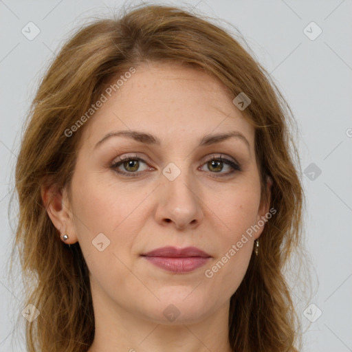 Joyful white young-adult female with long  brown hair and green eyes