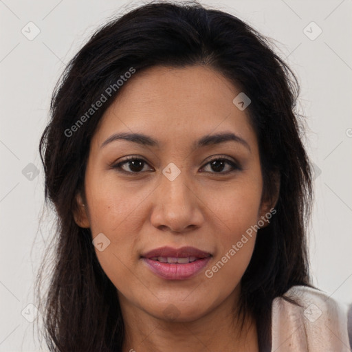 Joyful latino young-adult female with long  brown hair and brown eyes