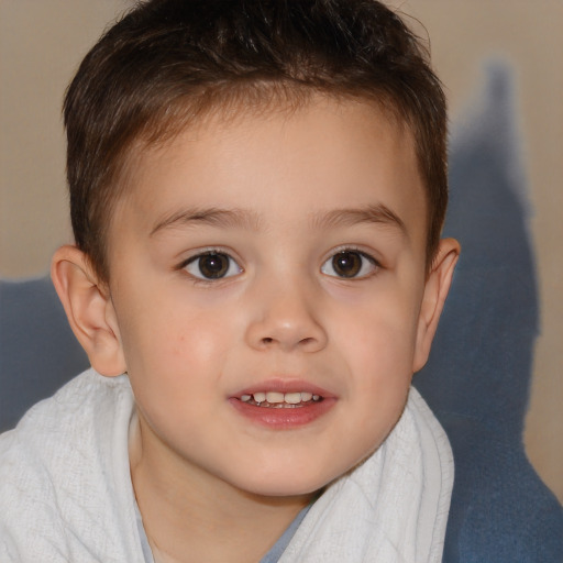 Joyful white child male with short  brown hair and brown eyes