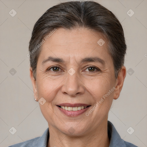 Joyful white adult female with short  brown hair and brown eyes