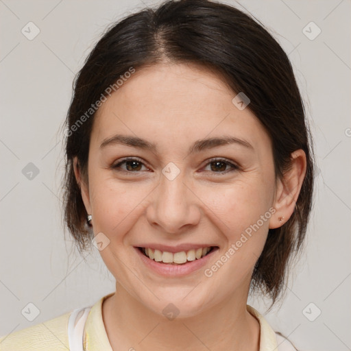 Joyful white young-adult female with medium  brown hair and brown eyes