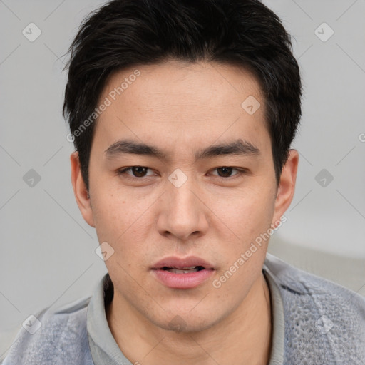 Neutral asian young-adult male with short  black hair and brown eyes