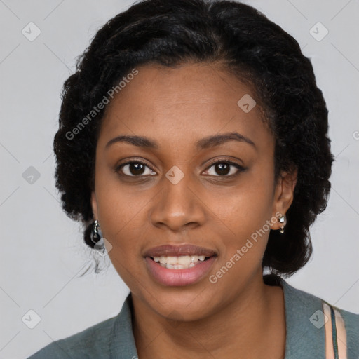 Joyful black young-adult female with long  black hair and brown eyes