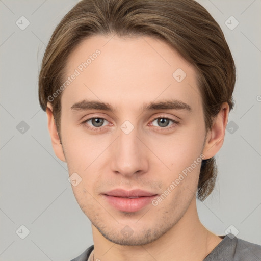 Neutral white young-adult male with short  brown hair and grey eyes