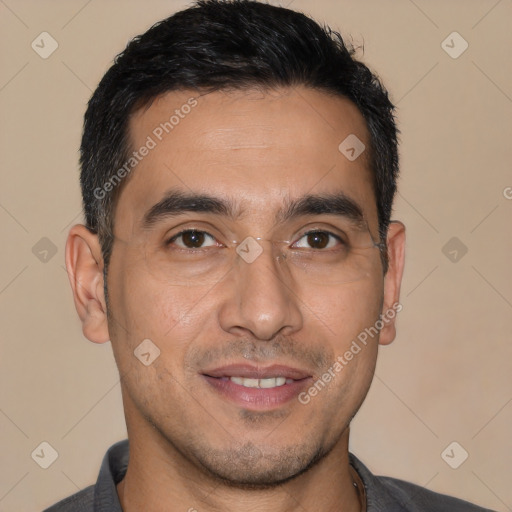 Joyful white young-adult male with short  black hair and brown eyes