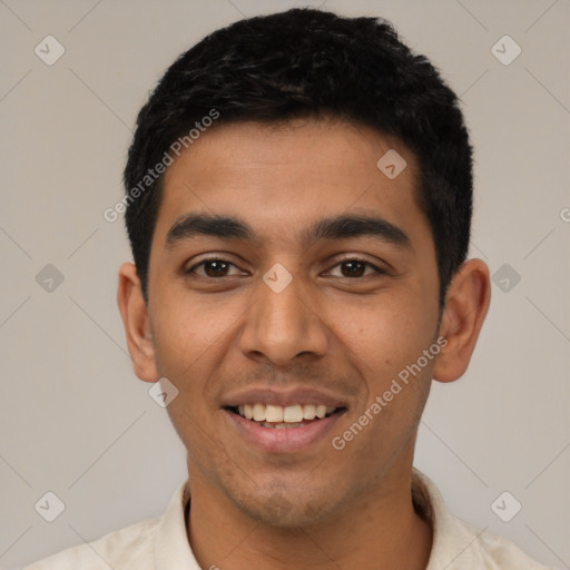 Joyful latino young-adult male with short  black hair and brown eyes