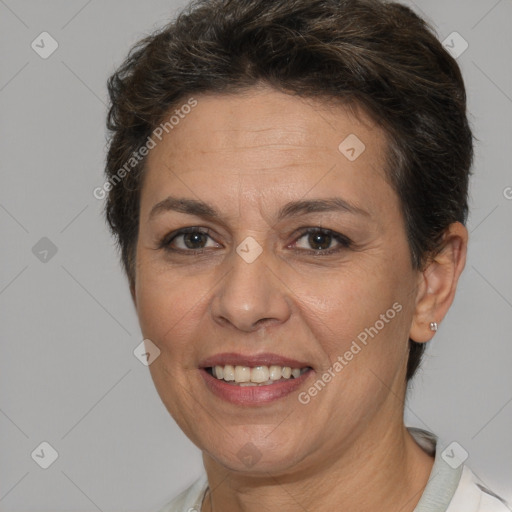 Joyful white adult female with short  brown hair and brown eyes