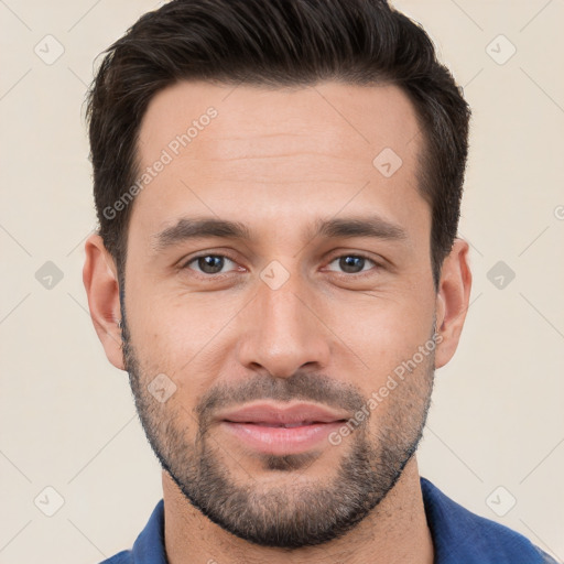 Joyful white young-adult male with short  brown hair and brown eyes