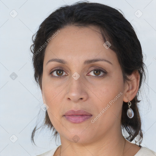 Joyful asian adult female with medium  brown hair and brown eyes