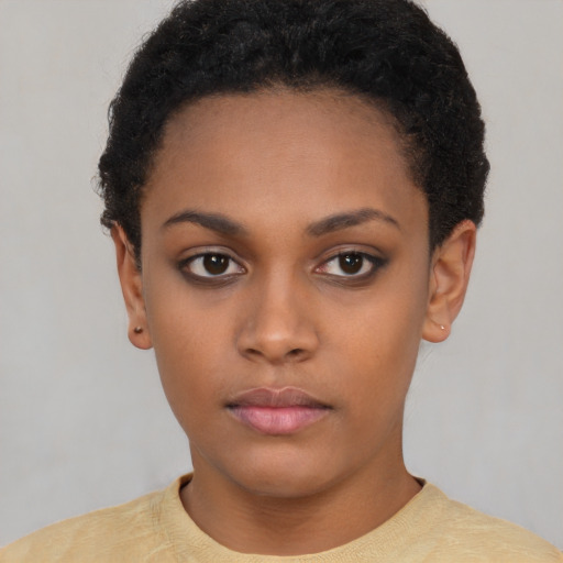 Neutral black young-adult female with short  black hair and brown eyes