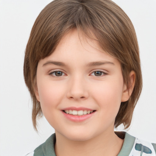 Joyful white child female with medium  brown hair and grey eyes