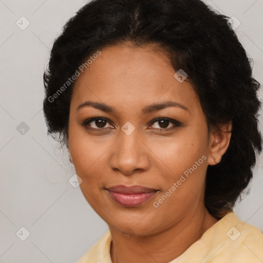 Joyful latino adult female with medium  brown hair and brown eyes