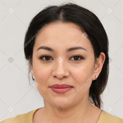 Joyful latino young-adult female with medium  brown hair and brown eyes