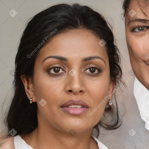 Joyful black young-adult female with medium  brown hair and brown eyes