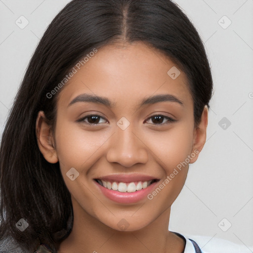 Joyful latino young-adult female with long  brown hair and brown eyes