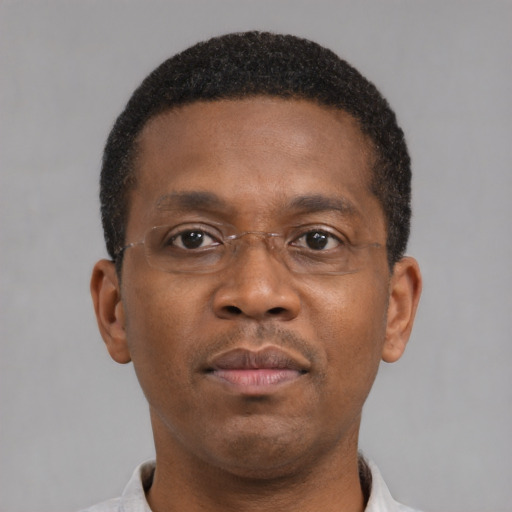 Neutral black young-adult male with short  brown hair and brown eyes