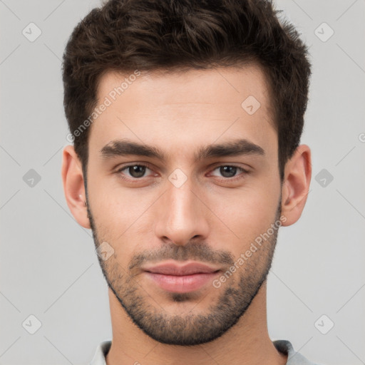 Neutral white young-adult male with short  brown hair and brown eyes