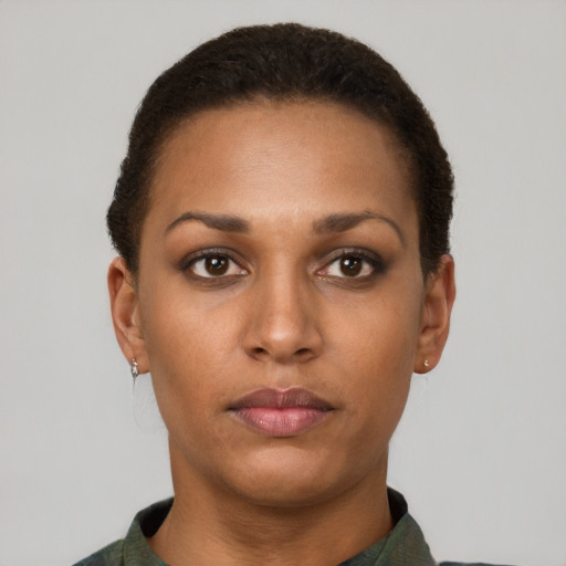 Neutral latino young-adult female with short  brown hair and brown eyes