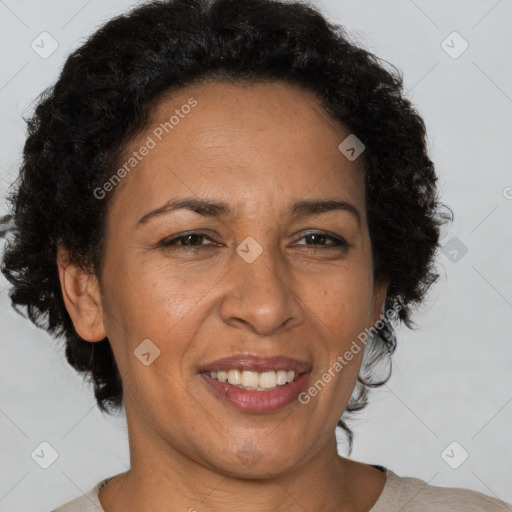 Joyful latino adult female with short  brown hair and brown eyes