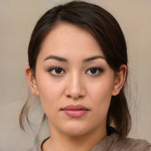 Neutral asian young-adult female with medium  brown hair and brown eyes