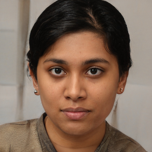 Neutral asian young-adult female with short  brown hair and brown eyes