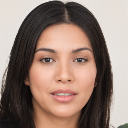 Joyful asian young-adult female with long  brown hair and brown eyes