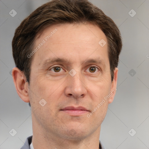 Neutral white adult male with short  brown hair and grey eyes