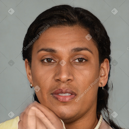 Joyful latino young-adult female with short  brown hair and brown eyes