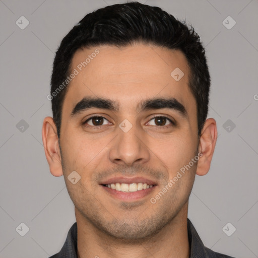 Joyful white young-adult male with short  black hair and brown eyes