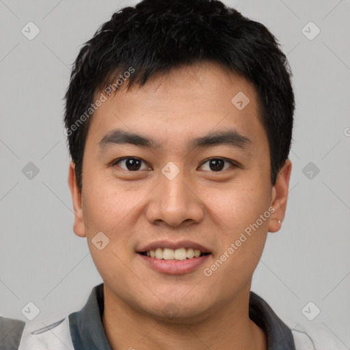 Joyful white young-adult male with short  black hair and brown eyes