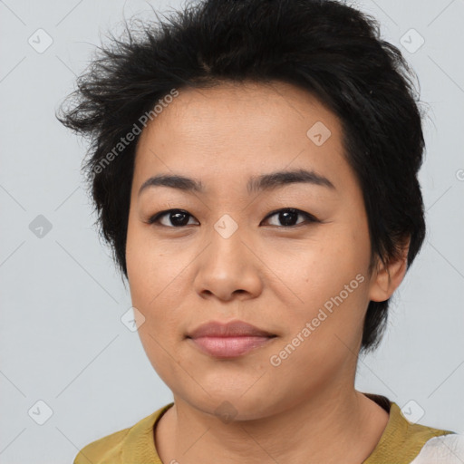 Joyful asian young-adult female with short  black hair and brown eyes