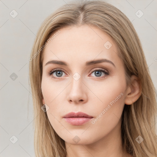 Neutral white young-adult female with long  brown hair and brown eyes