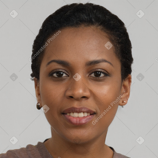 Joyful black young-adult female with short  black hair and brown eyes