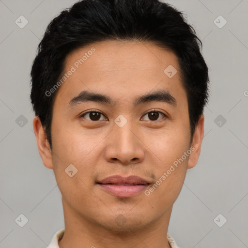 Joyful asian young-adult male with short  brown hair and brown eyes