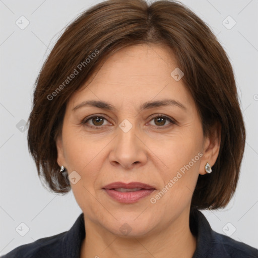 Joyful white adult female with medium  brown hair and brown eyes