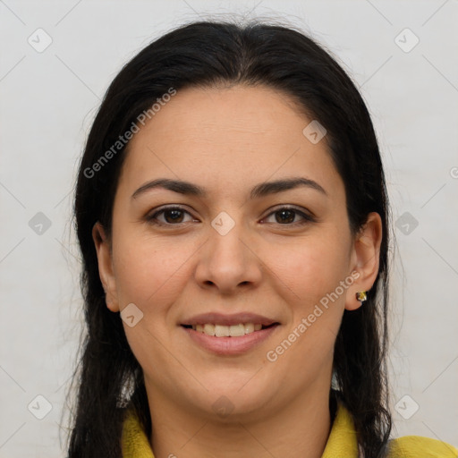 Joyful latino young-adult female with long  brown hair and brown eyes