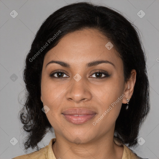 Joyful black young-adult female with medium  brown hair and brown eyes