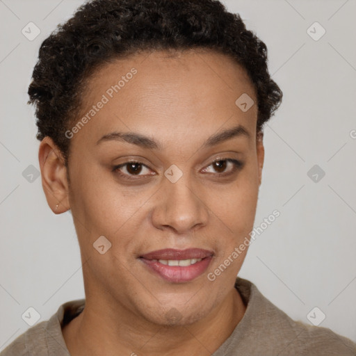 Joyful black young-adult female with short  brown hair and brown eyes