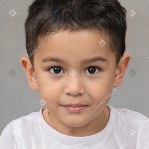 Joyful white child male with short  brown hair and brown eyes