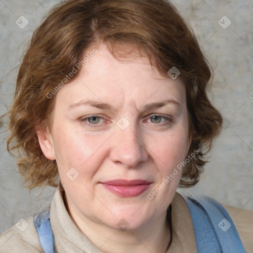 Joyful white adult female with medium  brown hair and blue eyes