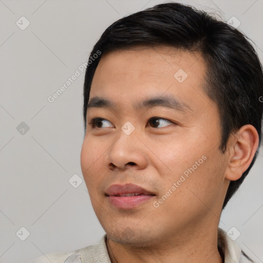 Neutral asian young-adult male with short  black hair and brown eyes