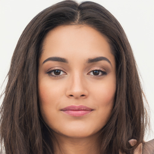 Joyful asian young-adult female with long  brown hair and brown eyes