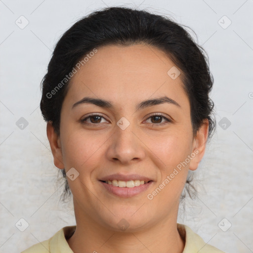 Joyful latino young-adult female with short  brown hair and brown eyes