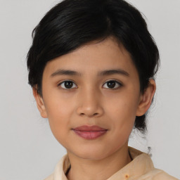 Joyful asian young-adult female with medium  black hair and brown eyes