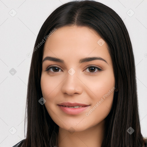 Joyful latino young-adult female with long  black hair and brown eyes